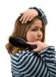 Girl Brushing Her Hair
