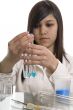 Female student at the education in chemistry