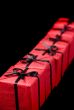 red gift boxes on black