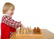 Little girl play chess