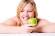 Smiling with her apple