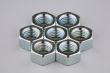 Seven metal nuts