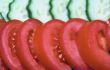 Tomatoes and cucumbers background