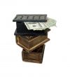 Stack of money in wooden books