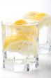 glasses with soda water and lemon