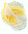 glass with soda water and lemon slices