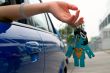 Holding car key