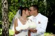 Groom and bride kiss