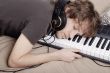 Man asleep on the MIDI-keyboard