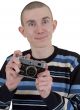 Young man with camera