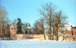 Red fortress wall and a church