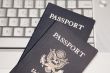 Passports on Laptop Keyboard