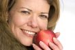 woman with red apple