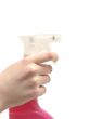 spray in woman hand