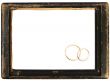 vintage wooden frame and wedding rings