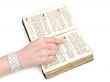 woman reading old book