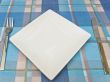 dish with fork and knife at tablecloth