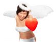Young woman at angel`s costume with red heart