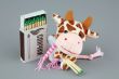 Cow with matches