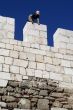 Worker on the stone wall
