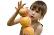 Fruit pyramid in boy`s hand