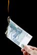 burning paper currency