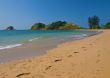 Pair of footprints on a tropical beach