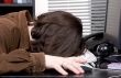 man sleep on working place