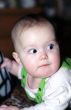 Infant looks at something with attention