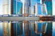 Skyscrapers at sunset and reflection
