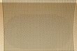 Metallic light golden perforated background