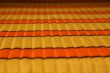Yellow-orange horizontal striped cloth background