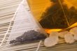 white tea, nylon tea-bag and sugar
