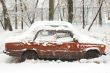 Red car in snowfall
