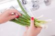 Woman Washing Onions