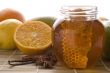 fresh honey with honeycomb, spices and fruits
