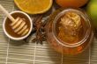 fresh honey with honeycomb, spices and fruits