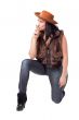 cowgirl in jeans, boots and cowboy hat