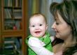 Laughing infant and mother