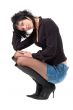 woman sitting on a white background