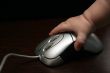 Child`s hand and mouse