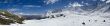 The picturesque mountain view with clouds, peaks and snow valey