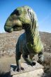 front of dinosaur big doll
