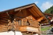 Wooden Alpine chalet with a balcony