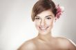 happy young woman with orchid