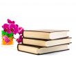 three books and  pink orchid