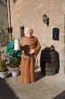 monk doll with beer