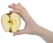 Cut apple in a female hand