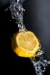 The slice of fresh lemon with water drops