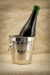 Champagne bottle in metallic bucket